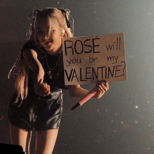 One blink boy say to ease by giving her a big paper in which he wrote "Rose will you be my valentine ?"