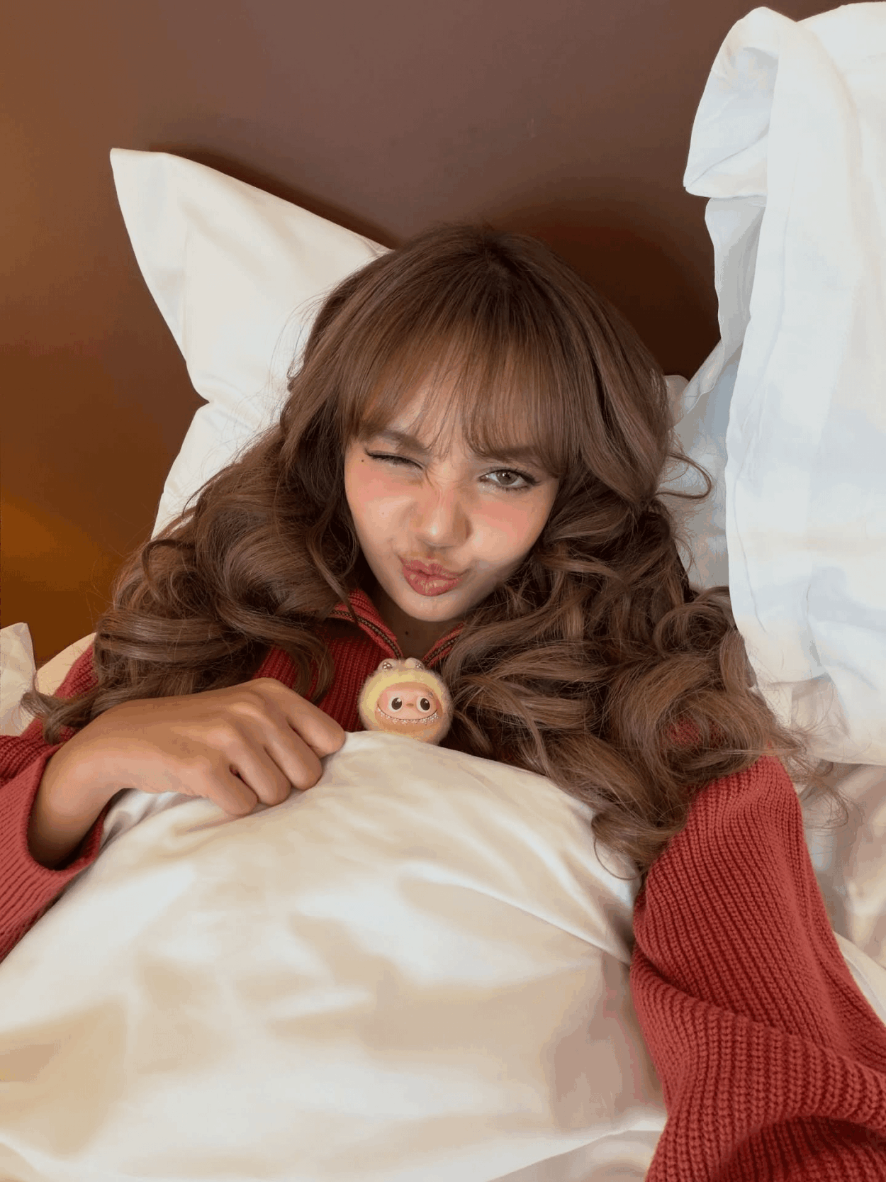 Lisa snuggled up in bed