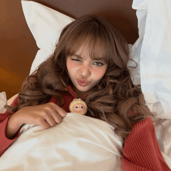 Lisa snuggled up in bed